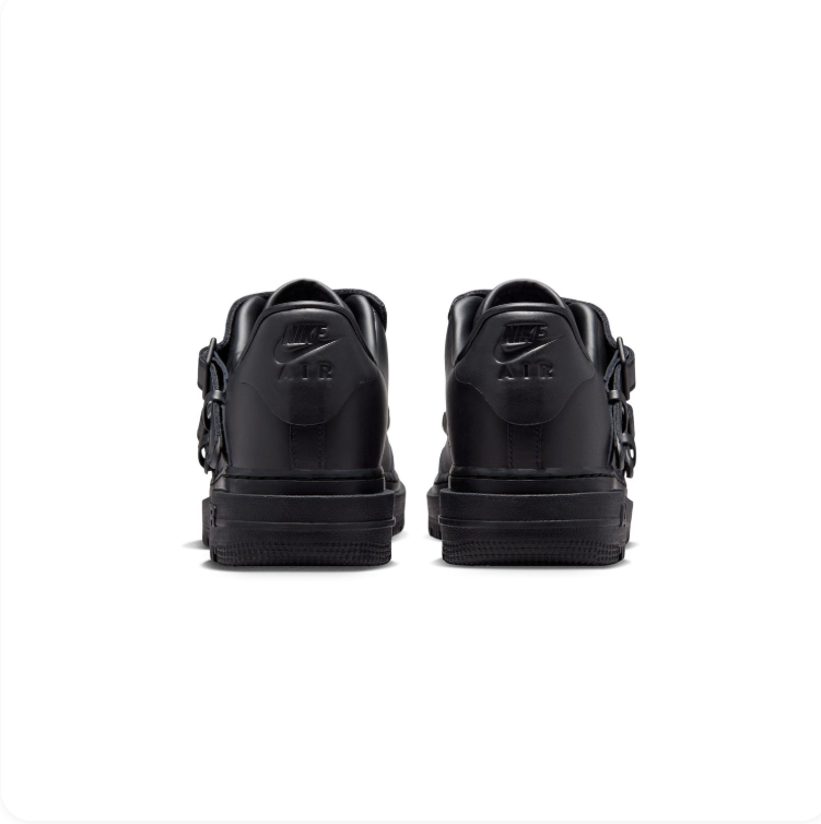 Nike Black Low-Top Sneakers with Buckle Straps & Metallic Swoosh