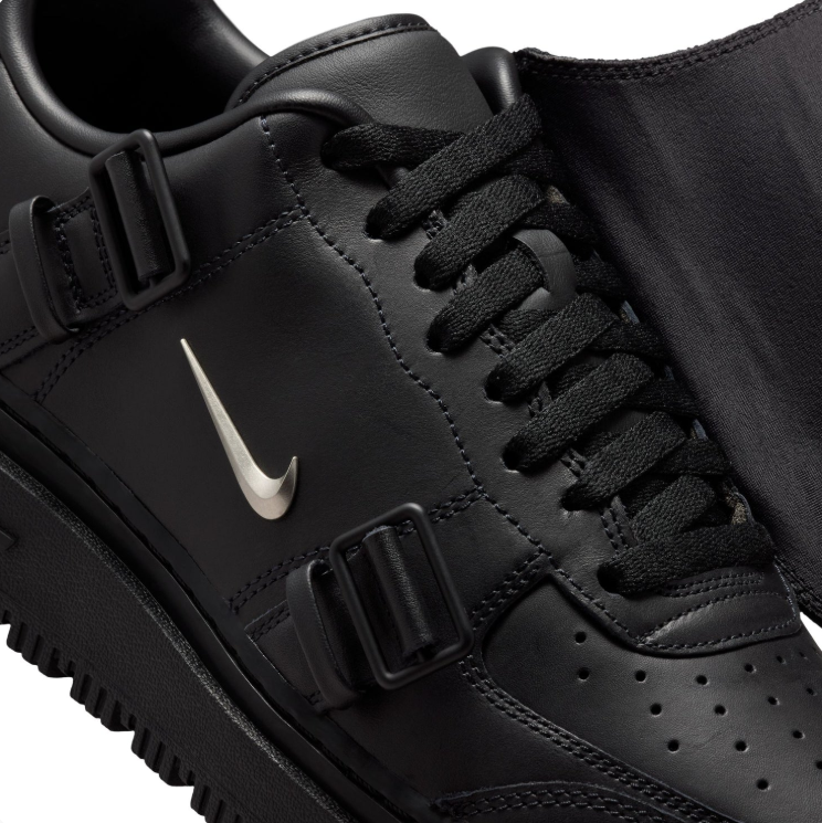 Nike Black Low-Top Sneakers with Buckle Straps & Metallic Swoosh